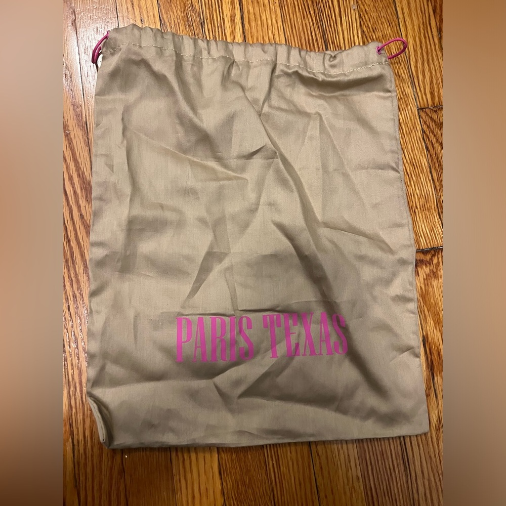 beige paris texas dust bag